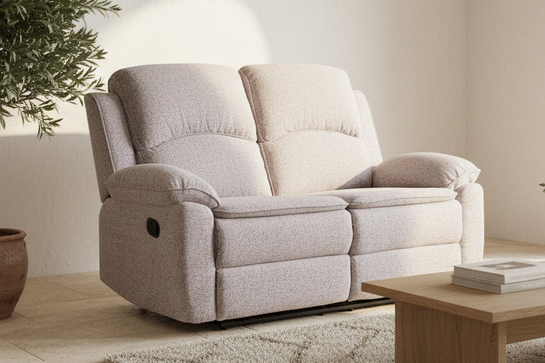 Bronte beige 2 seater recliner sofa in a living room